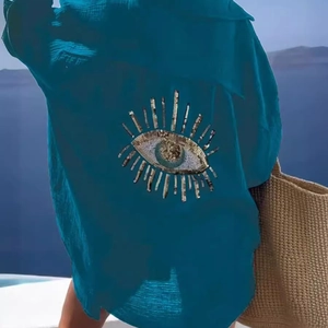 Deep blue long sleeve blouse with sequined evil eye embroidery on back for vacation style