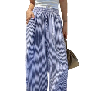 Blue and white vertical striped wide-leg pants with drawstring waist and side pockets