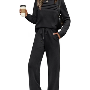 Women's black two-piece casual set with long sleeve pleated top and wide leg pants