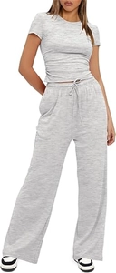 Detailed view of grey two-piece set featuring ruched side t-shirt and wide leg drawstring pants