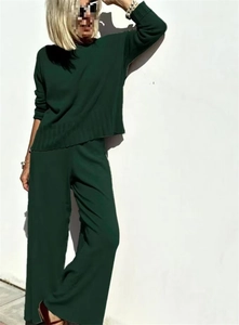 Detail showing the vertical ribbed knit hem and flowy fabric of the wide-leg pants set