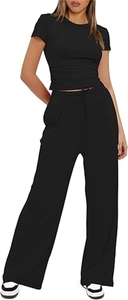 Front view of women's black two-piece lounge set with short sleeve top and wide-leg pants