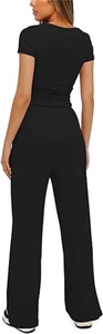 Rear view of women's black two-piece lounge set with short sleeve top and wide leg pants