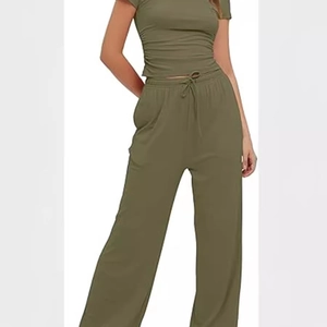 Women's summer two-piece lounge set with olive green short sleeve top and wide leg pants