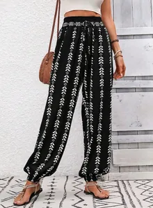 Detail view of ethnic geometric print harem pants with drawstring elastic waist and cuffs