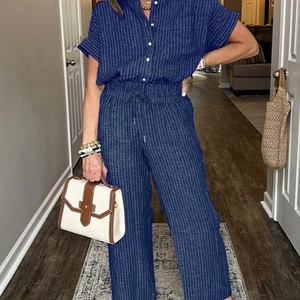 Women's navy blue vertical striped two-piece set with short sleeve shirt and wide leg pants