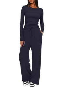 Detail of dark blue loungewear set with drawstring waist and wide-leg knit trousers