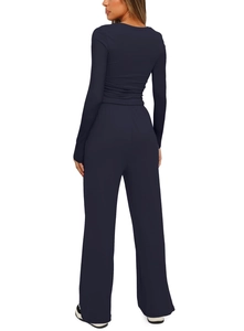 Rear view of long sleeve top and wide leg pants set in navy blue soft knit fabric