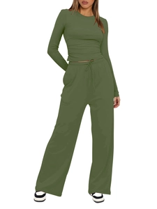 Detailed close-up of olive green long sleeve top with waist ruching and drawstring waist