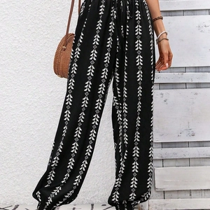 Women's bohemian geometric print harem pants with high waist drawstring and cuffed ankles
