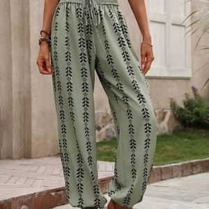 Women's boho lantern pants with green geometric prints and drawstring high waist