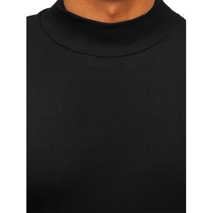 Detail of black mock neck long sleeve top showing fabric texture and collar stitching