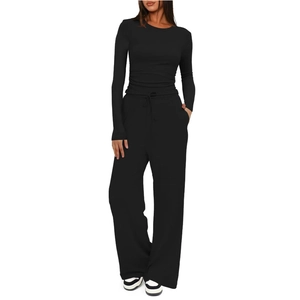 Women's black two-piece casual set featuring long sleeve top and wide leg drawstring pants