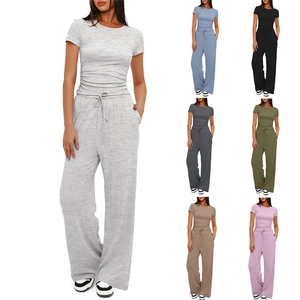 Γυναικείο Top And Bottom Casual Σύνολο από Πολυεστέρα Πλισέ Κοντομάνικο T-Shirt και Παντελόνι με Φαρδύ Μπατζάκι