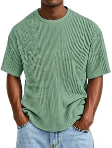 Detail of men's sage green knit T-shirt showing vertical ribbed texture and crew neck