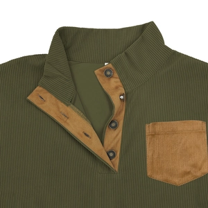 Detail of army green ribbed fleece sweatshirt with brown suede pocket and metal snap buttons