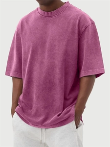 Detail of washed purple heavy cotton t-shirt showing vintage texture and ribbed neckline