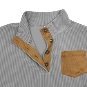 Detail of grey corduroy sweatshirt with brown suede collar and vintage metal buttons