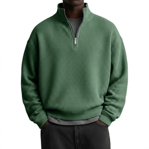Men's forest green waffle knit quarter-zip polo sweatshirt with a relaxed fit