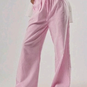 Pantaloni casual da donna a righe rosa con gamba larga e vita elastica con coulisse