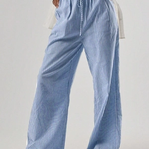 Pantaloni a gamba larga a strisce blu e bianche a vita alta con coulisse regolabile