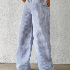 Women's casual blue and white striped wide-leg pants with elastic waist and side pockets