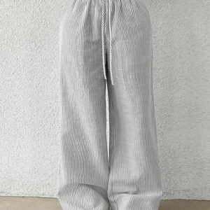 Women's vertical grey and white striped wide-leg trousers with elastic drawstring waist