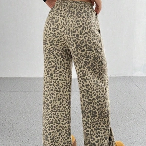 Pantaloni larghi a vita alta da donna con stampa leopardata classica ed elastico in vita