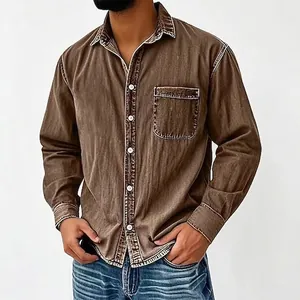 Close-up of vintage brown washed men's shirt showing turn-down collar and chest pocket