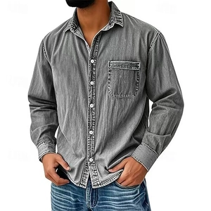 Detail of grey vintage washed long sleeve shirt with chest pocket and white buttons