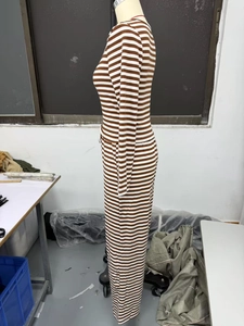 Detail of coffee and white striped knit set featuring long sleeves and high waist pants