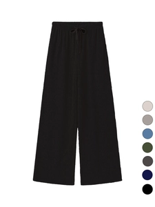Détail du pantalon côtelé à taille haute avec cordon de serrage et choix de 7 coloris