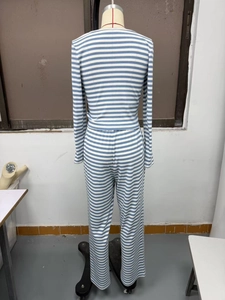 Detail view of blue and white striped knit loungewear set with fine ribbed texture fabric