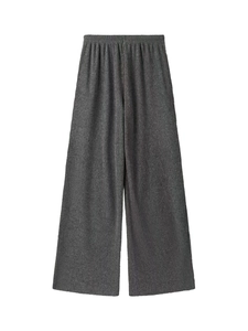 Détail de la texture côtelée gris foncé et de la taille élastique du pantalon large