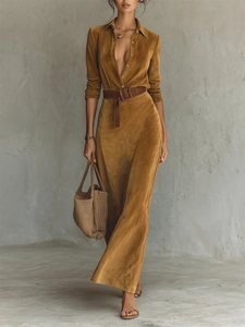 Detail of tobacco brown suede shirt dress featuring lapel collar and square buckle belt