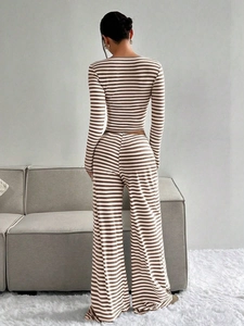 Rear view of striped long sleeve crop top and high waist wide leg pants set in brown and white