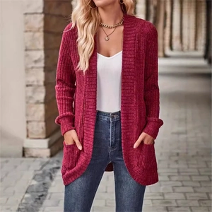Detail showing the ribbed knit texture and symmetrical side pockets on wine red cardigan
