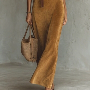 Elegant tan suede maxi dress with waist belt and long sleeves for autumn fashion