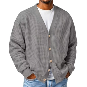 Men's loose V-neck waffle knit cardigan sweater in grey with classic button closure