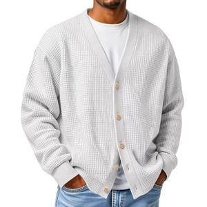 Light gray waffle knit cardigan for men with V-neck and wooden buttons in a loose fit
