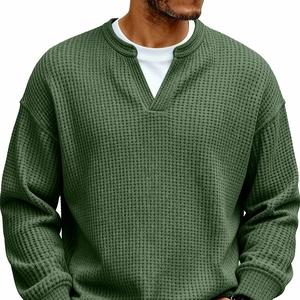 Men's olive green waffle knit long sleeve henley shirt with minimalist crew neck design