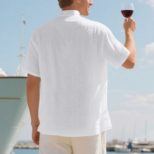 Men white linen shirt with stand collar showing relaxed fit and fabric texture