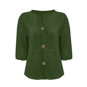 Detailed view of the V-neckline and dark wooden buttons on this dark green cotton linen shirt