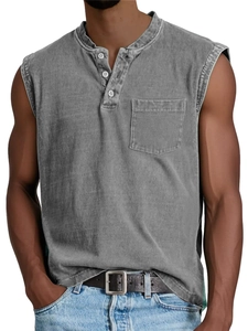 Detail of vintage washed cotton Henley tank top with buttoned placket and chest pocket