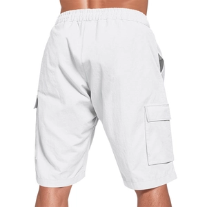 Detailed back view of white cargo shorts featuring a large side pocket and clean cut