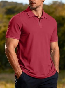 Macro shot of dark red men's polo shirt featuring breathable waffle texture and collar