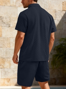 Men's navy blue polo and shorts set with detailed geometric knit texture view