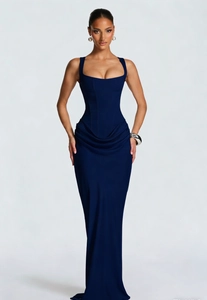 Detail view of navy blue bodycon dress featuring elegant waist drapes and corset design