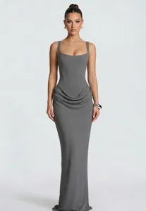 Detailed view of dark grey corset dress with waist ruching and square neckline