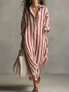 Detail view of red striped oversized maxi dress with collar and practical side pockets